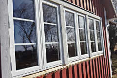 Sidohängda fönster med spröjs