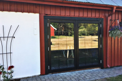 Pardörr i trä med spröjs